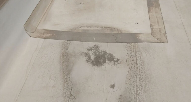 Improper slope at scupper (common problem on flat roofs that causes deterioration and leaks)